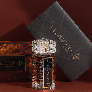Urban Scent Tobacco Vanilla Eau De Parfum bottle and packaging on a refined background.