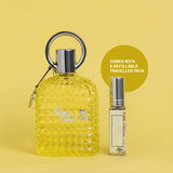 Sun And Sand Perfume 100ml bottle with a refillable traveller pack, showcasing its vibrant design and convenience.