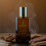 Smoking Gun Eau De Parfum by Urban Scent in a sleek bottle with wooden accents and wisps of smoke.