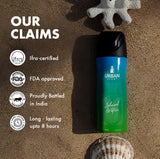 Island Water Deodorant body spray bottle on sand with claims of being ifra-certified and FDA approved.