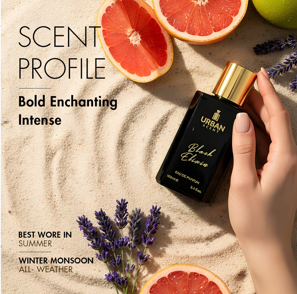 Black Elixir Eau De Parfum bottle on sandy surface with citrus fruits and lavender accents.
