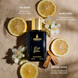 Urban Scent Deep Blue Eau de Parfum with notes of lemon, mint, and spice on a wooden surface.