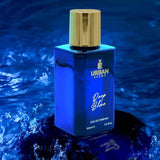 Urban Scent Deep Blue Eau de Parfum bottle on water background, 100ml Unisex fragrance.